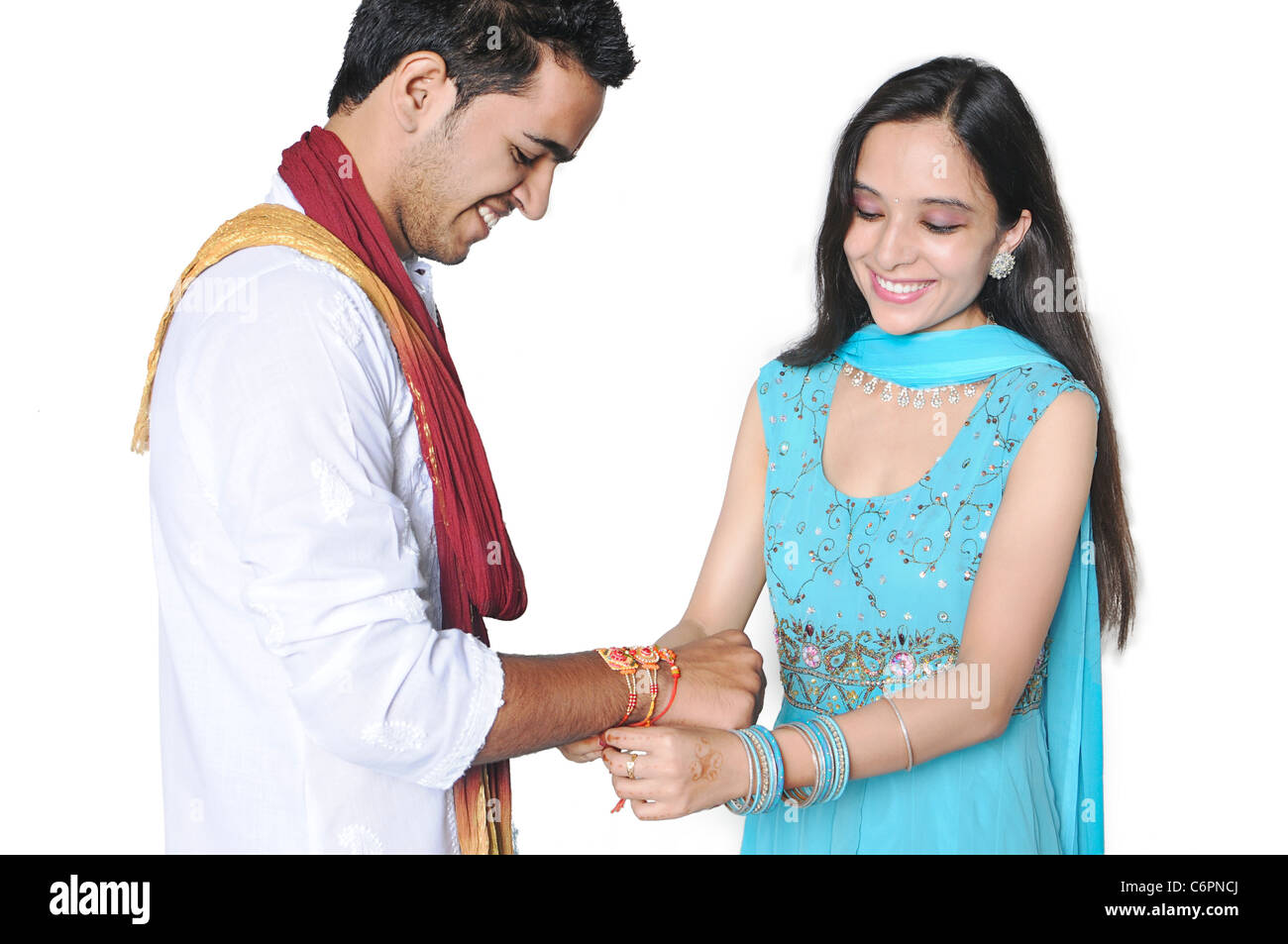 Sister tying Rakhi on her brother's wrist on the occasion of Rakshabandhan Stock Photo
