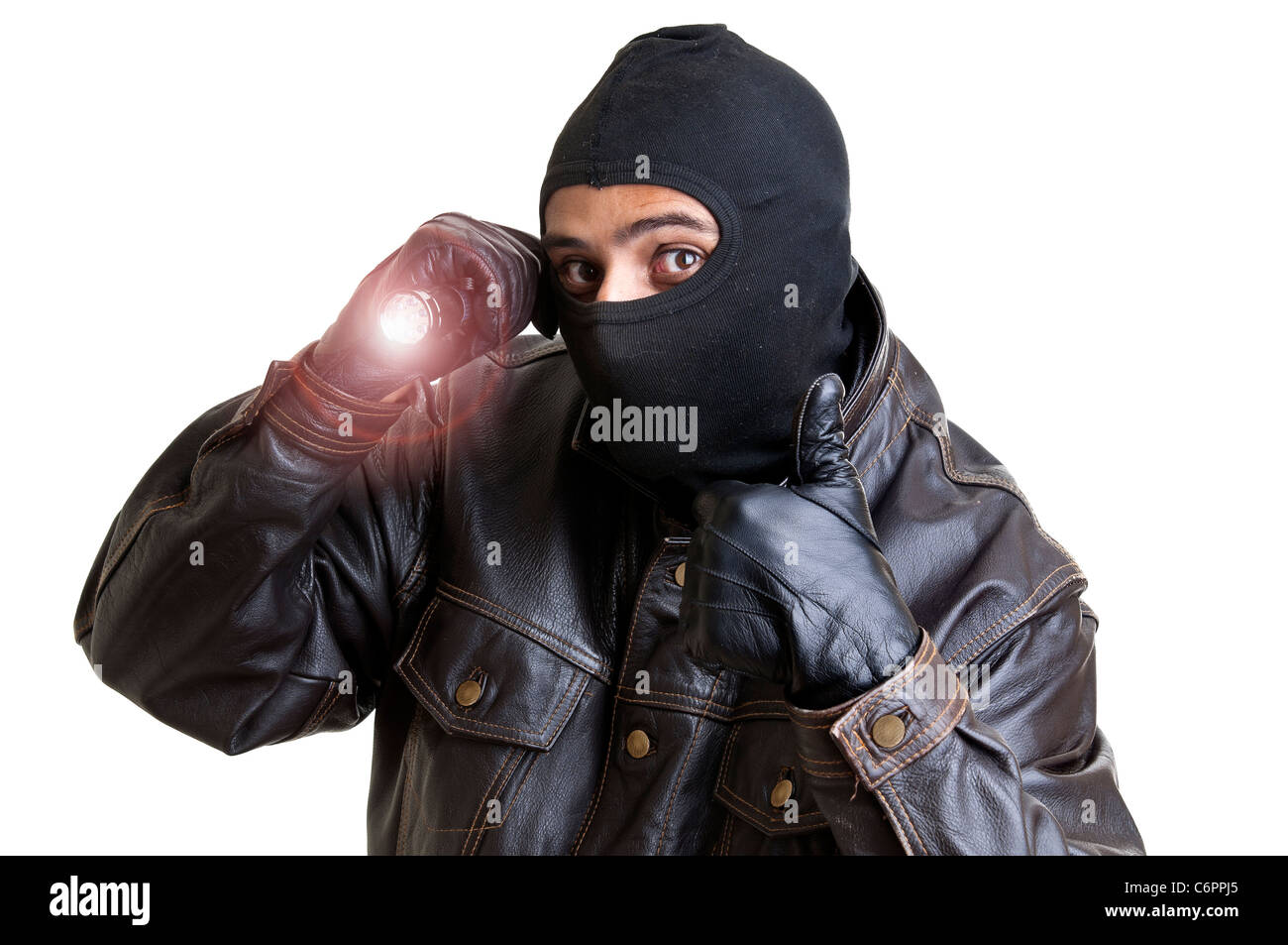 Burglar with flashlight isolated in white Stock Photo
