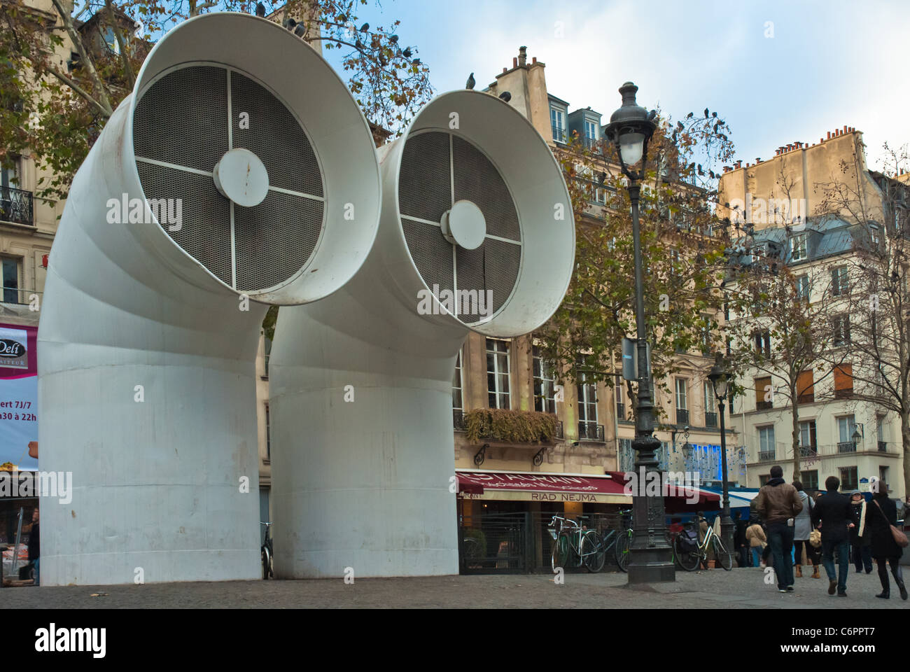 Enormous air vents of the Pompidou Art Centre, Paris, towering over the street scene. Post Modern architecture. Stock Photo
