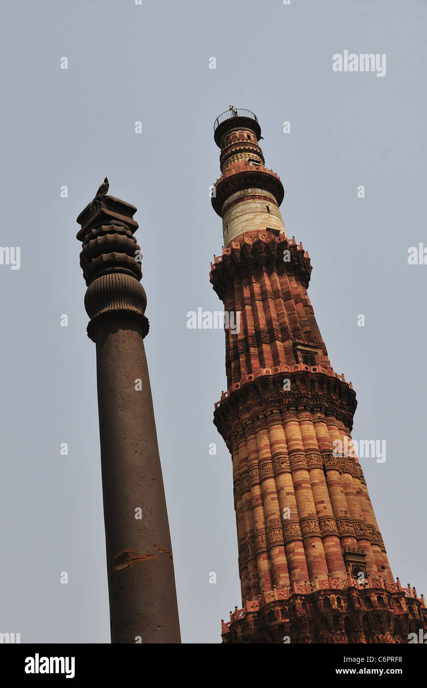 Kutub Minar and The iron pillar of Delhi in Delhi. Stock Photo