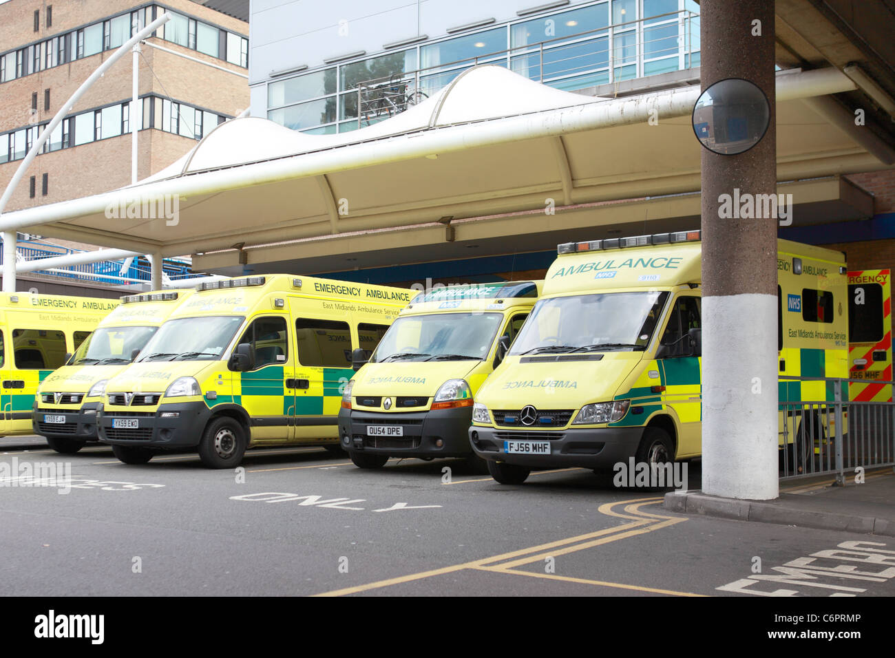 'ambulance UK' ' 'emergency services' Ambulances parked outside the accident and emergency entrance Stock Photo