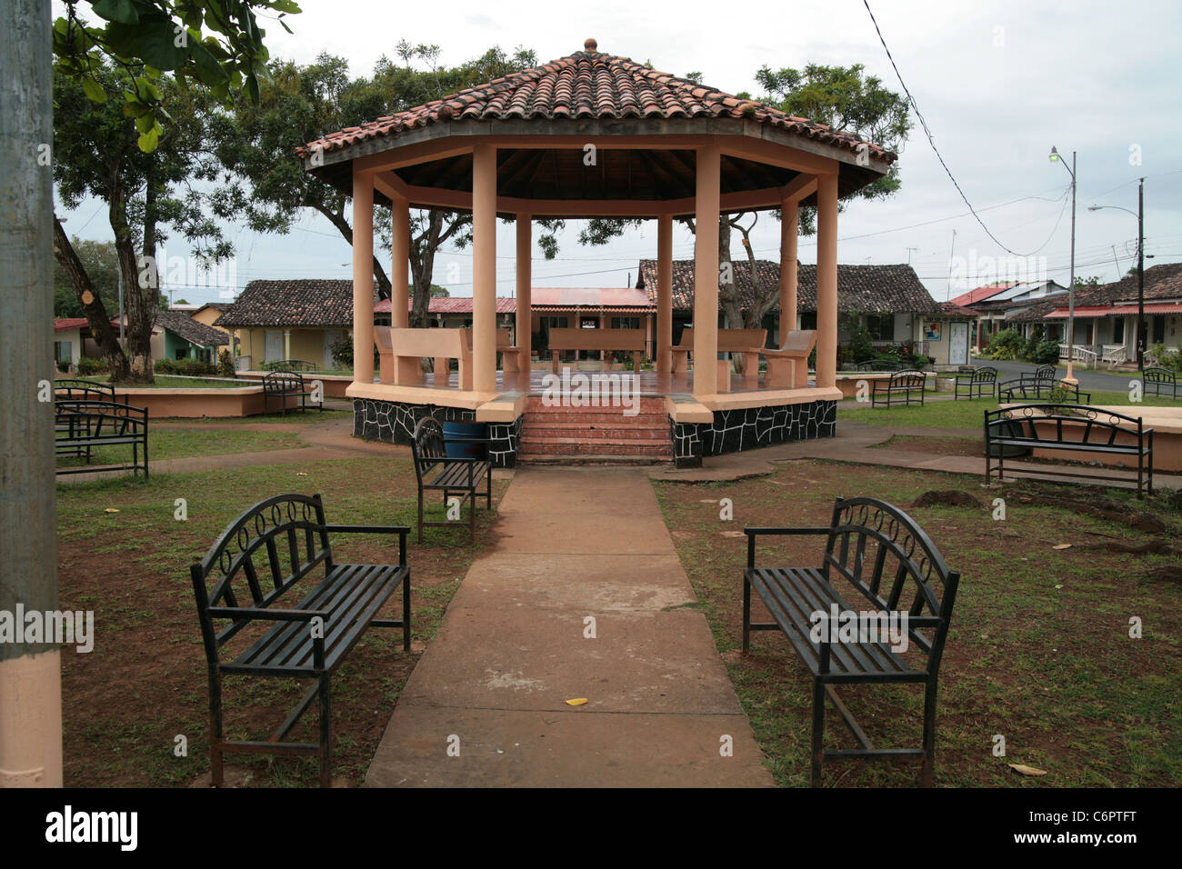 Gazebo at the main central plaza park of a small rural town of the Azuero (Los Santos Herrera) region of Panama, exterior bench. Stock Photo