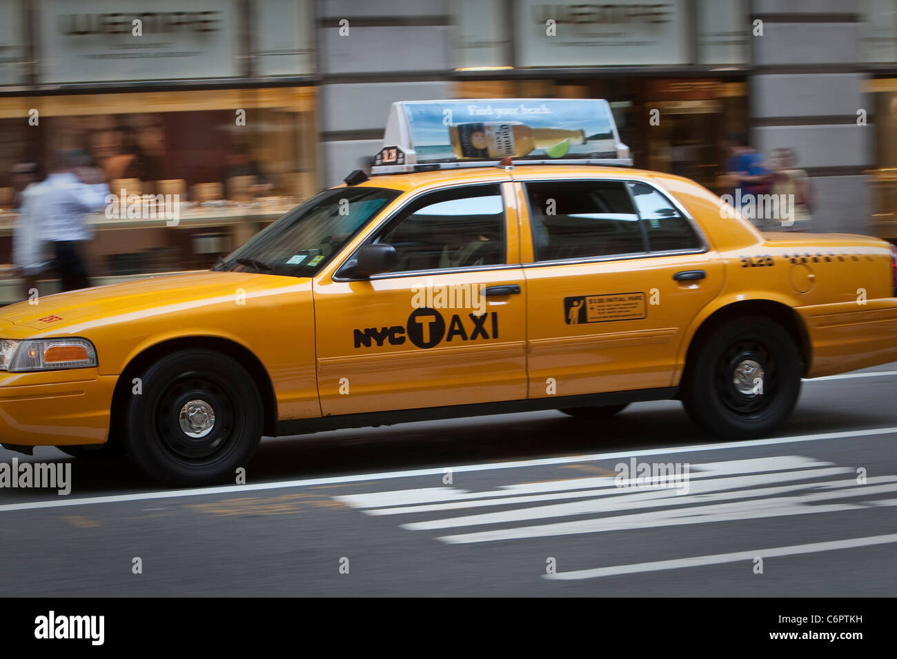 A NYC Taxi is pictured in the New York City borough of Manhattan, NY, Tuesday August 2, 2011. Stock Photo