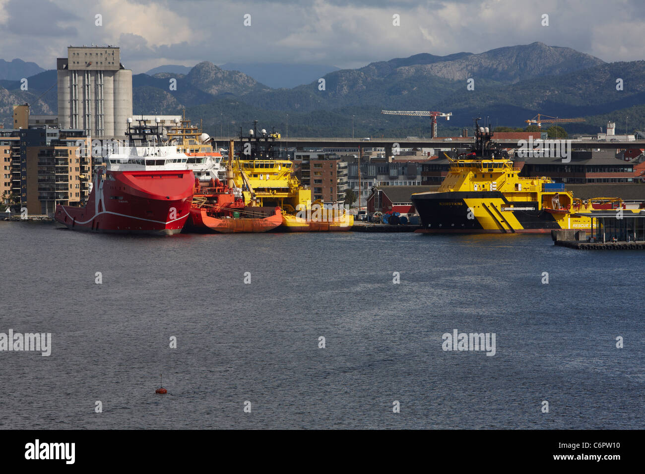 Anchor handling and offshore service vessels, including KL Saltfjord and Njord Viking, moored in the Port of Stavanger, Norway. Stock Photo