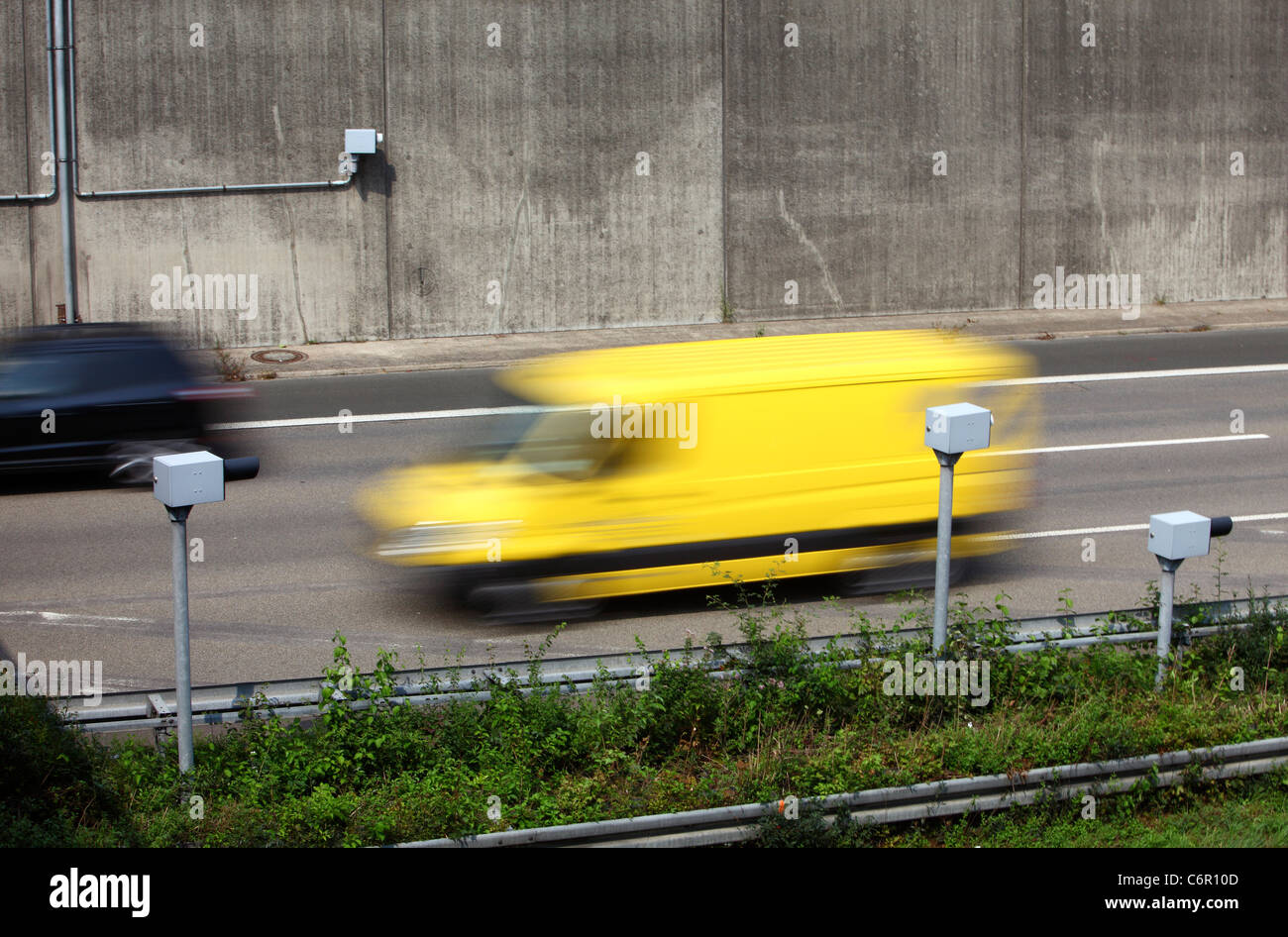 Speed cameras and flash at the A44 Autobahn, motorway. Controlling a