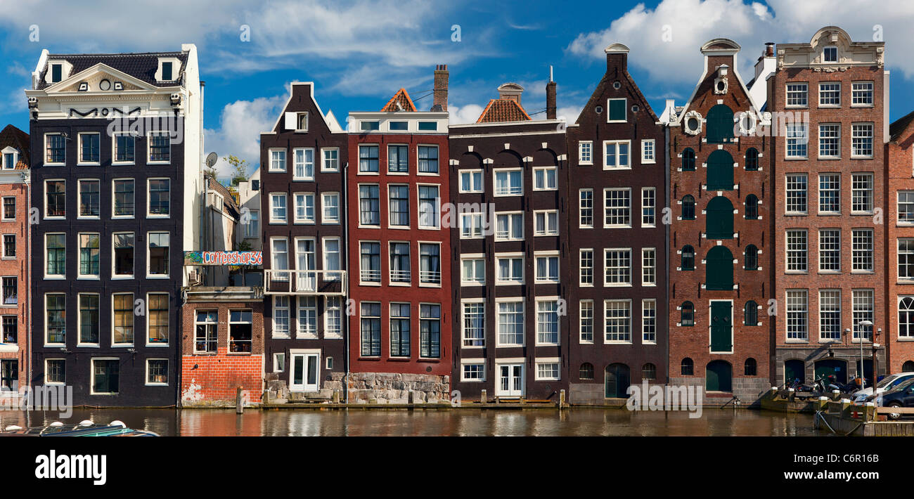 Europe, Netherlands, Amsterdam, Row Houses along the Canal Stock Photo