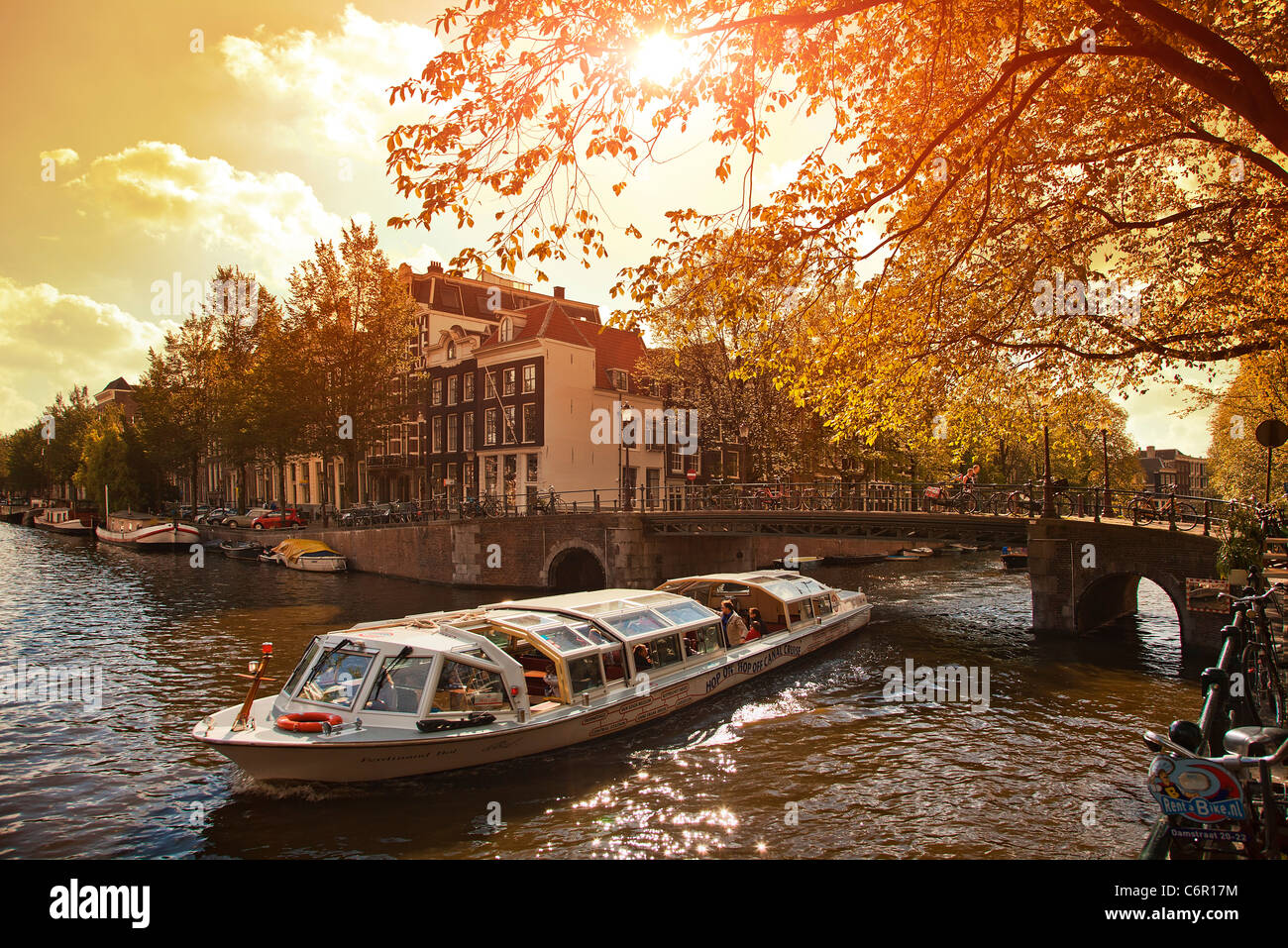 Europe, Netherlands, Amsterdam, Tour Boat on Canal Stock Photo