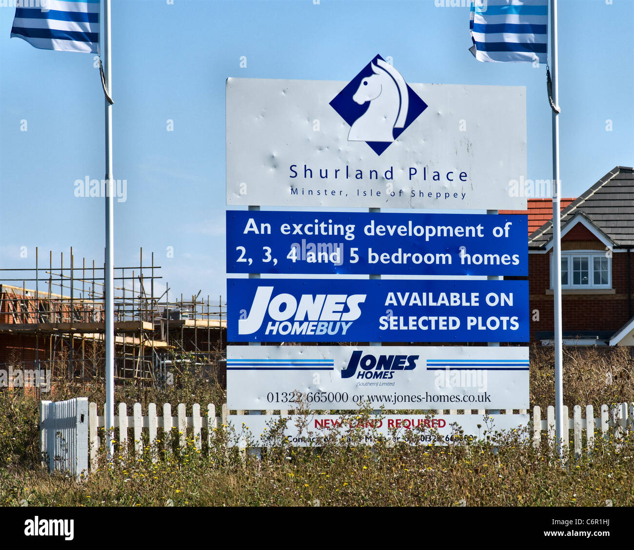 Builder Jones Homes sign, damaged by vandals with an air gun and throwing stones. Shurland Place, Minster on Sea, Sheppey, Kent Stock Photo