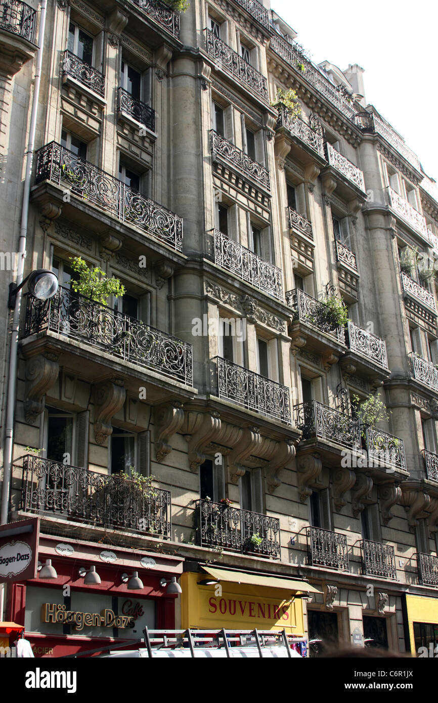 Traditional Paris apartments with wrought iron railings Stock Photo