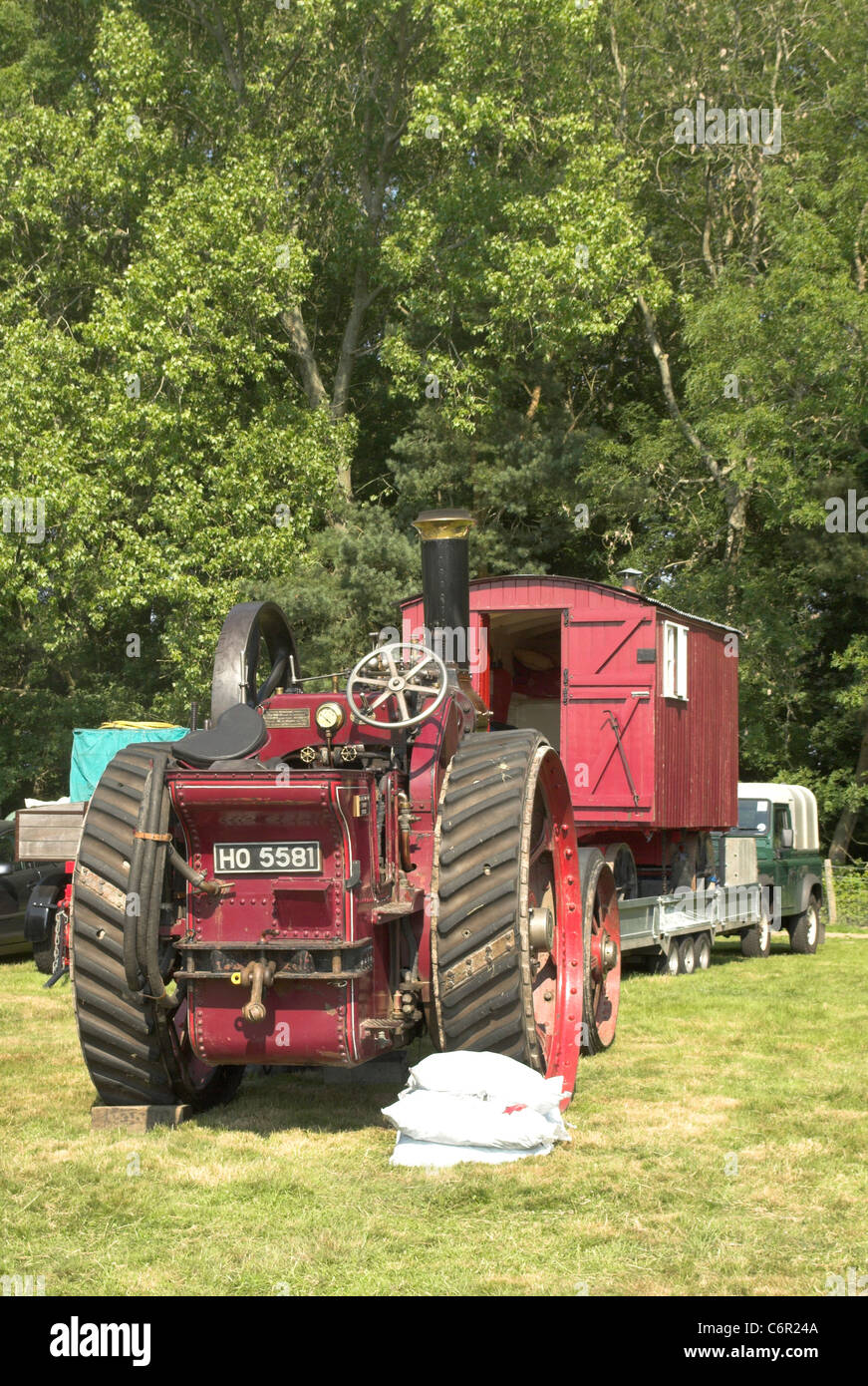 A scene from a Steam Rally featuring a Marshall 7nhp General Purpose Traction Engine - built 1911. Stock Photo