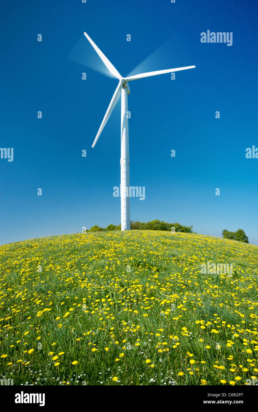 Wind turbine under blue sky Stock Photo