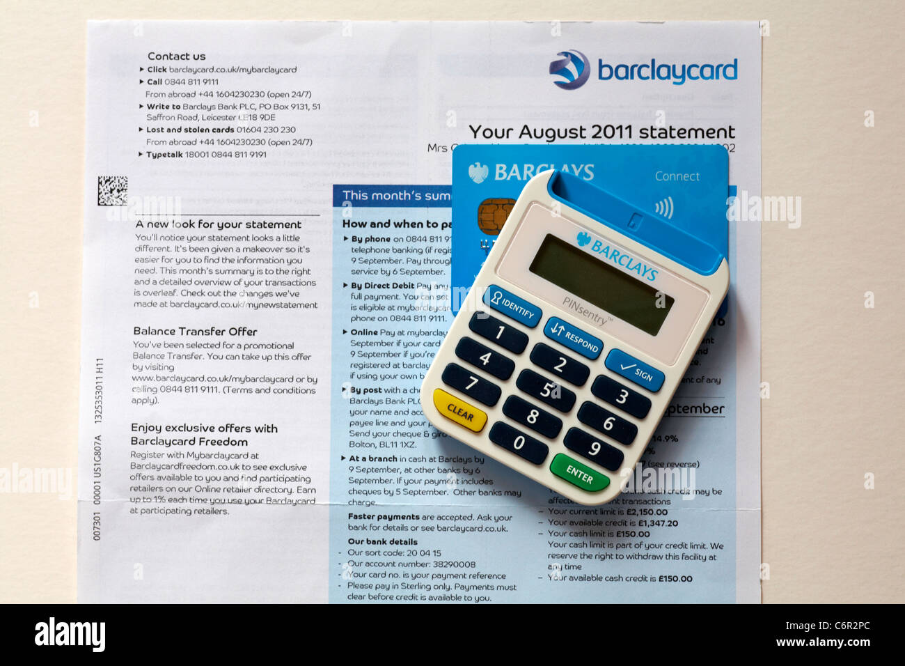 Preparing to pay Barclaycard statement with Barclays PINsentry machine and Connect card Stock Photo