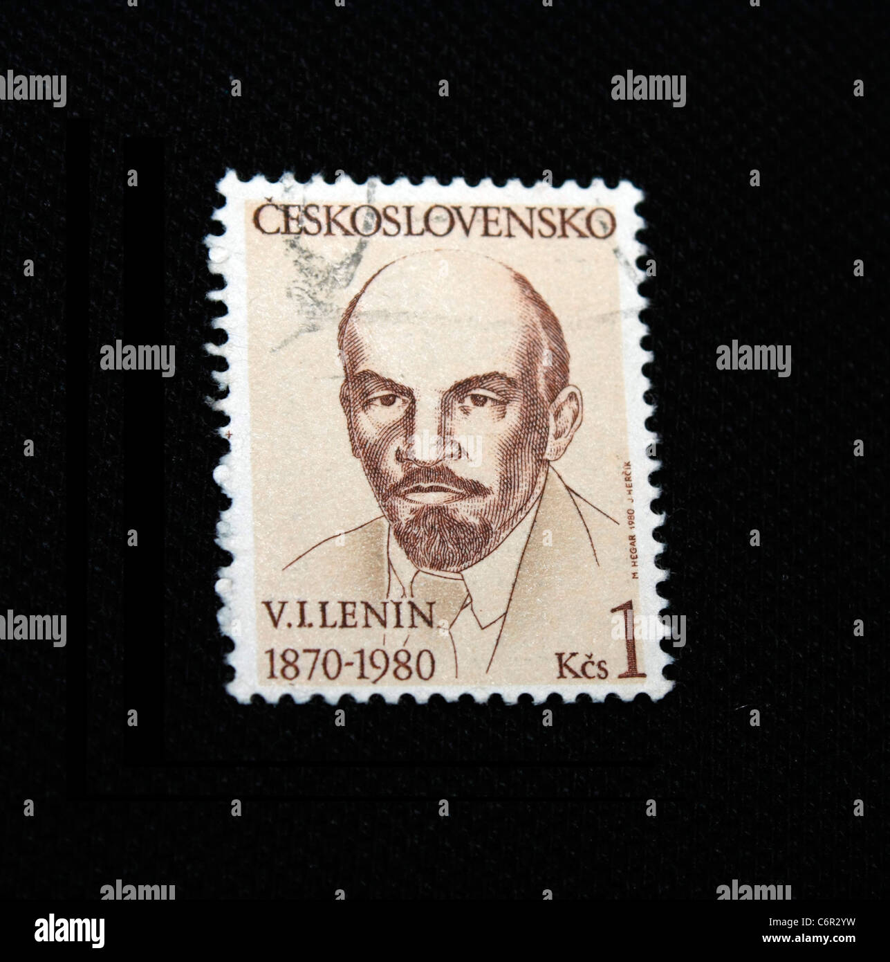 A Postage Stamp Isolated In Black Stock Photo Alamy