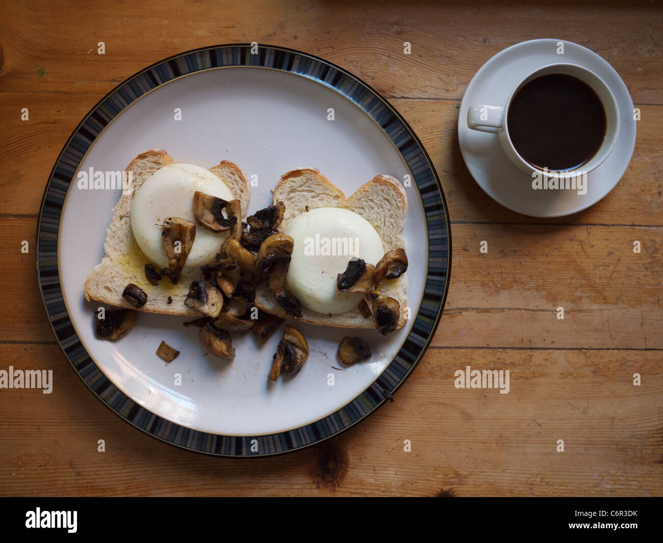 Poached Egg and Mushrooms on toast with Black coffee Stock Photo Alamy