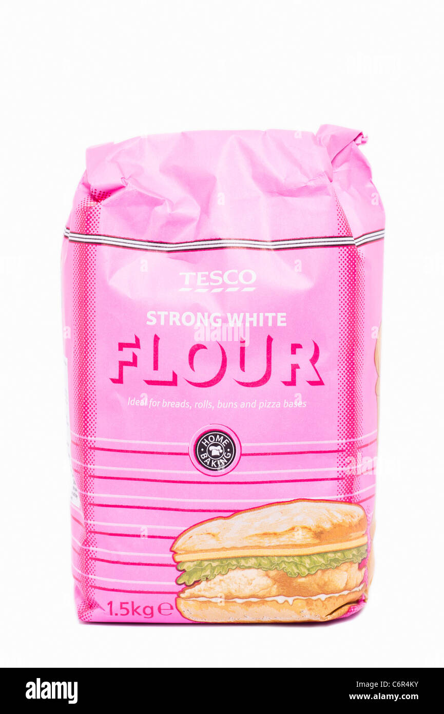 A packet of Tesco strong white flour for baking on a white background