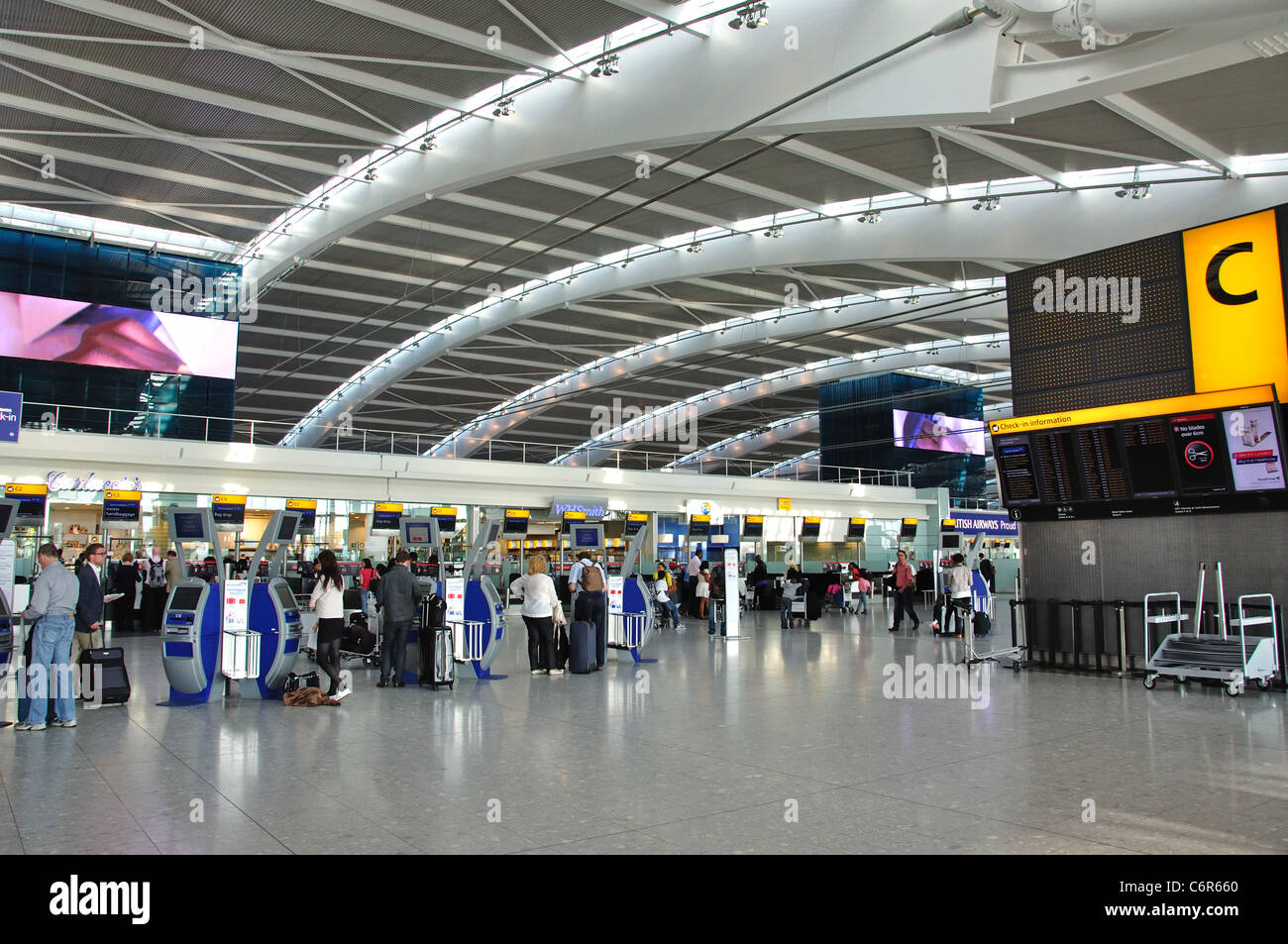 Departure level interior, Terminal 5, Heathrow Airport. London Borough of Hounslow, Greater London, England, United Kingdom Stock Photo