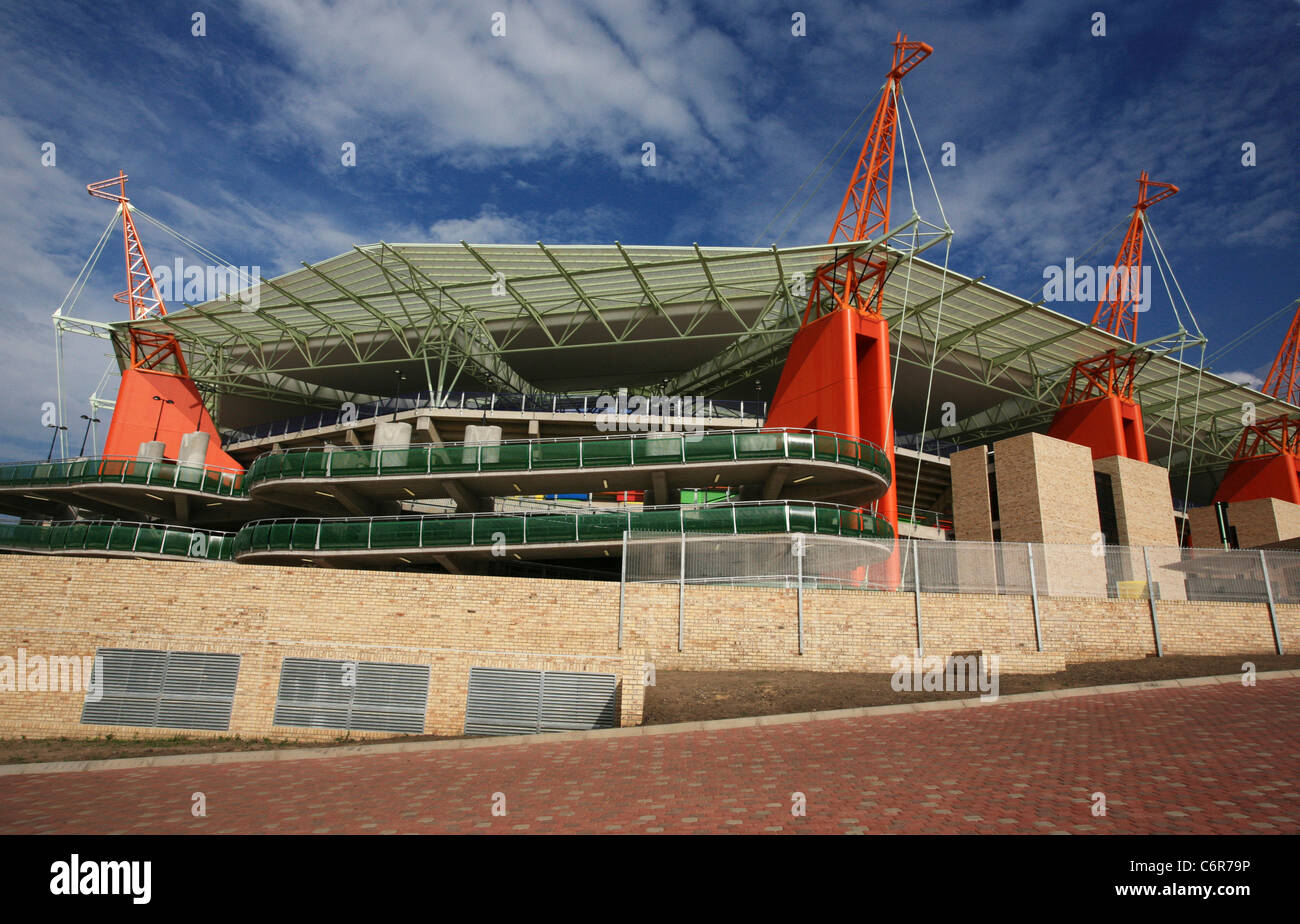 Daytime view of the Mbombela stadium exterior showing the orange Giraffe structures used to support the roof Stock Photo