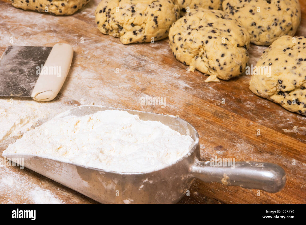 flour and rising balls of scone dough, D'Angelo Pastry and Bread, Santa Barbara, California, United States of America Stock Photo