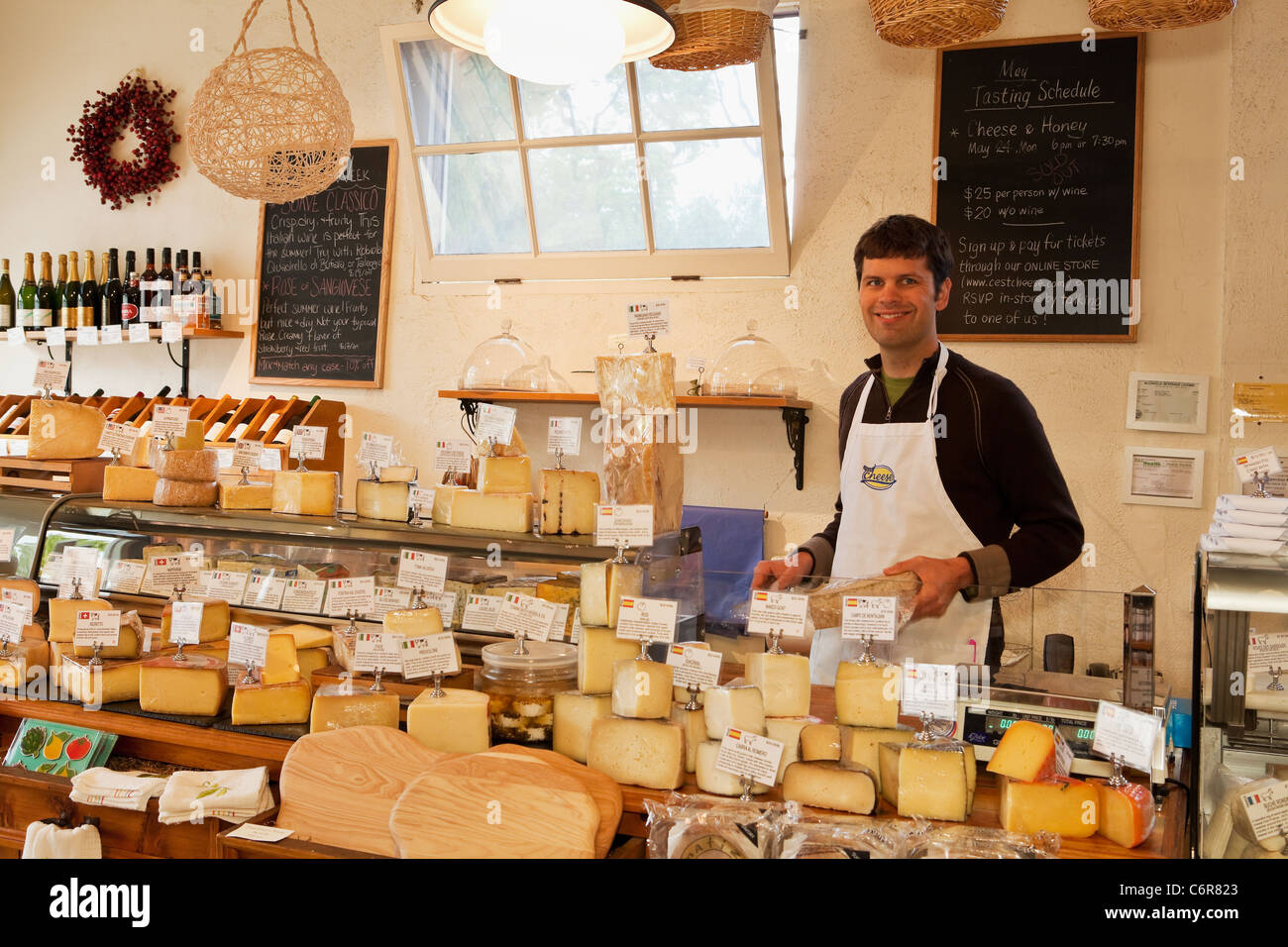 owner Michael Graham at C'est Cheese, a cheese shop in Santa Barbara, California, United States of America Stock Photo