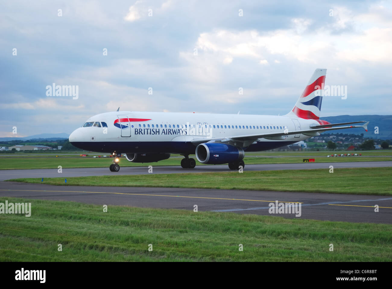 British Airways aircraft on the runway at Glasgow International Airport Stock Photo