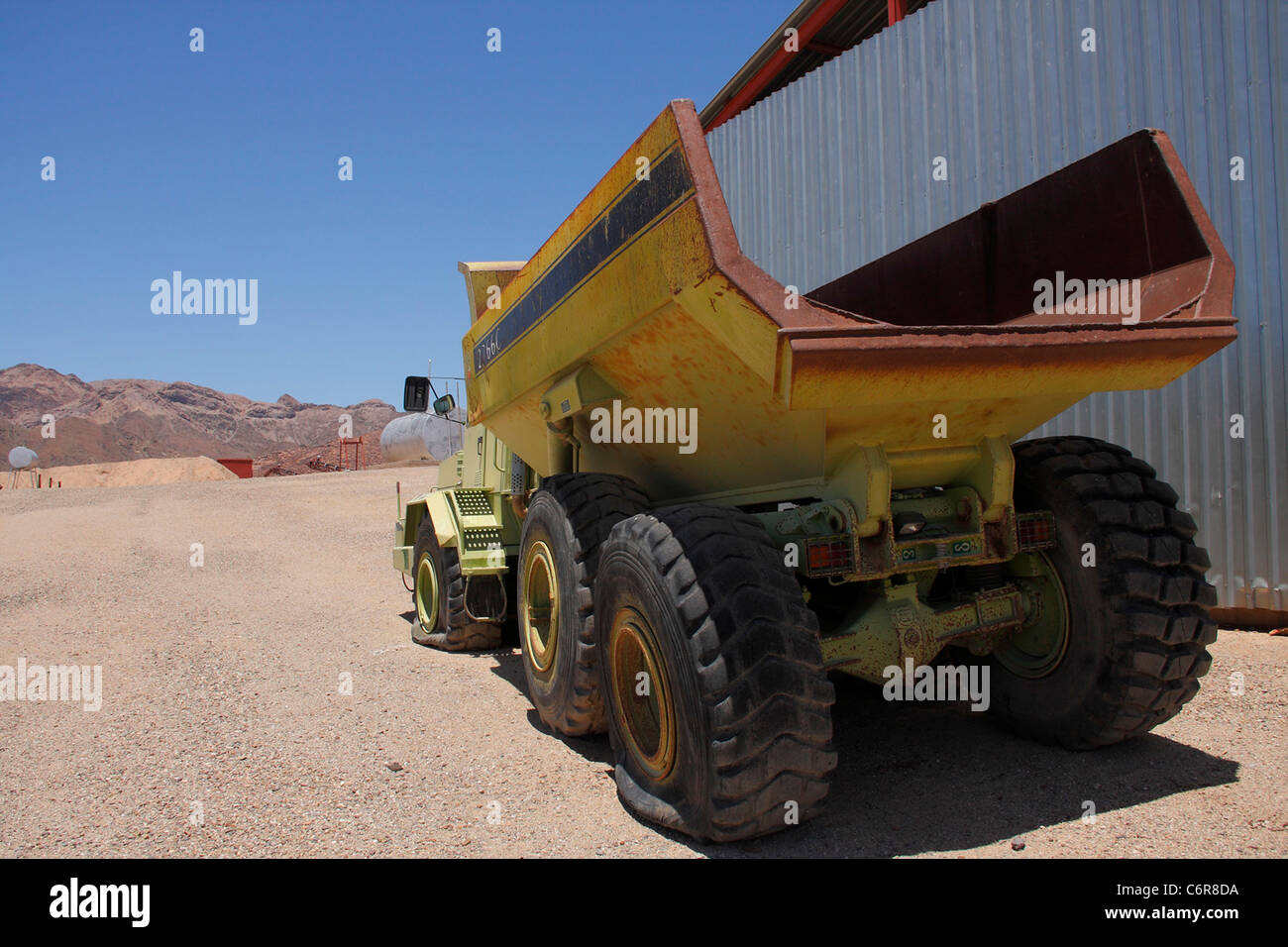 Abandoned tipper truck at disused mine Stock Photo