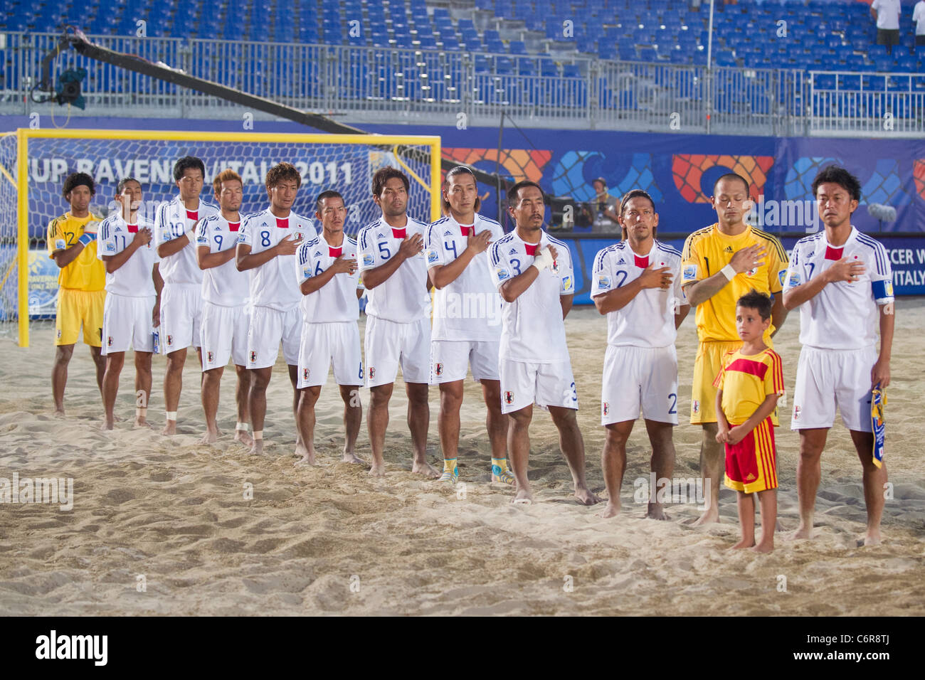 Beach Soccer : Japan team group line-up for the Crescentini Trophy match between Italy 1-2 Japan. Stock Photo