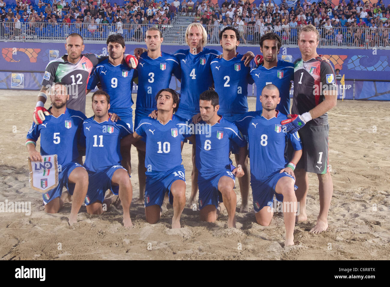 Beach Soccer : Italy team group line-up for the Crescentini Trophy match between Italy 1-2 Japan. Stock Photo