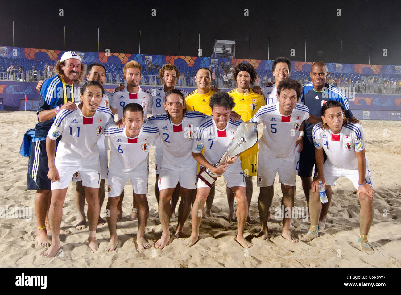 Beach Soccer : Japan team group line-up for the e Crescentini Trophy match between Italy 1-2 Japan. Stock Photo