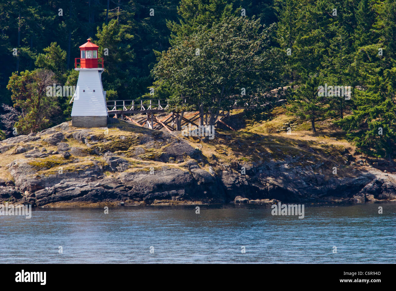 Portlock Point Lighthouse on Prevost Island in the Gulf Islands off the coast of Vancouver, British Columbia, in Canada. Stock Photo