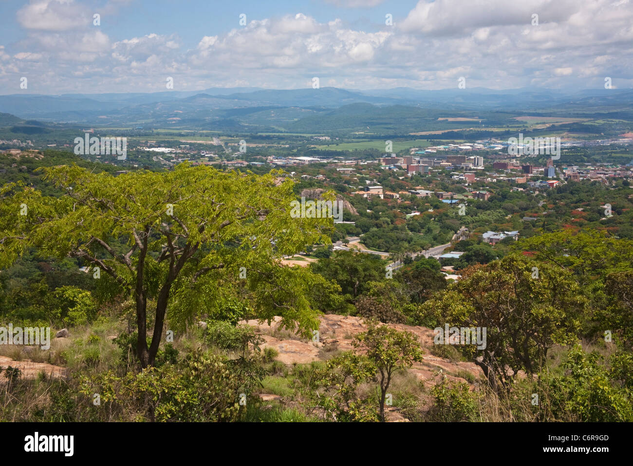 Scenic view of Nelspruit town and surrounding suburbs towards distant mountains Stock Photo