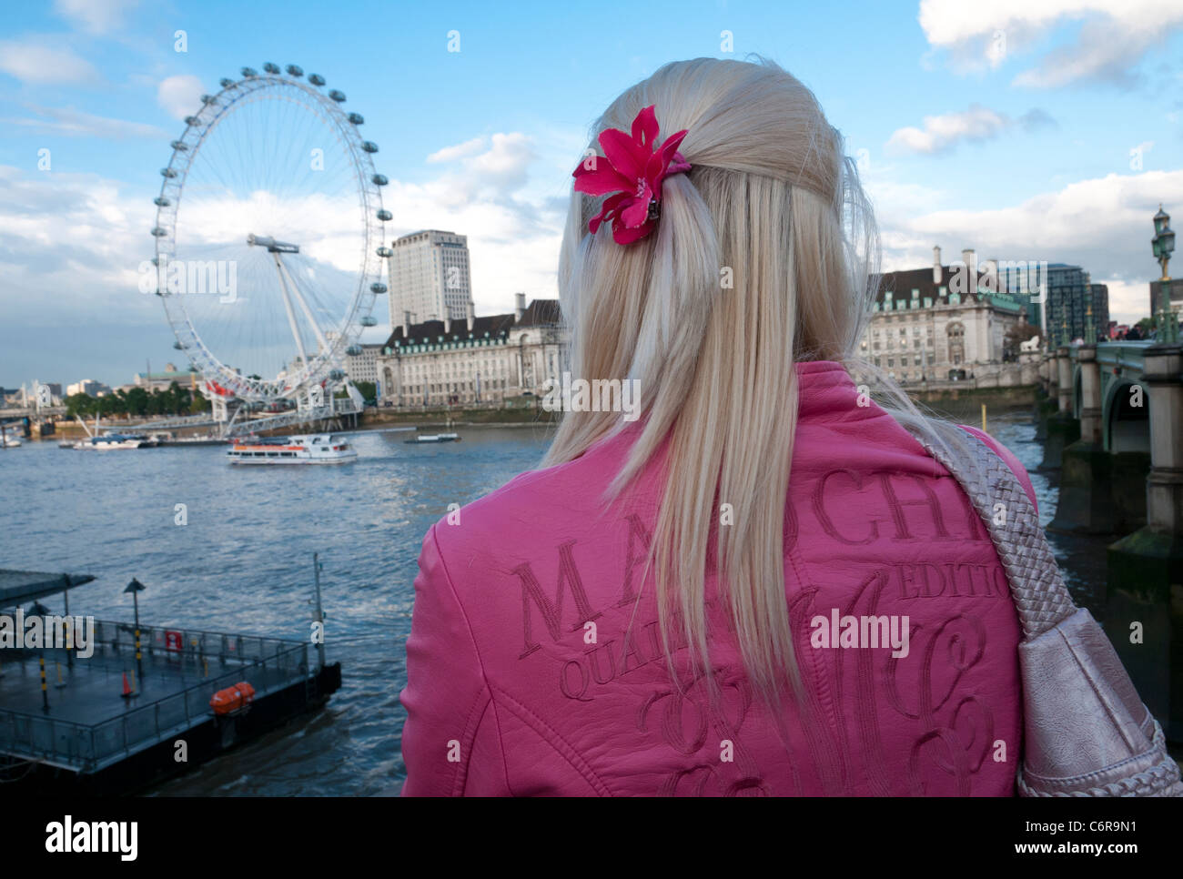 Woman on bridge london hi-res stock photography and images - Alamy