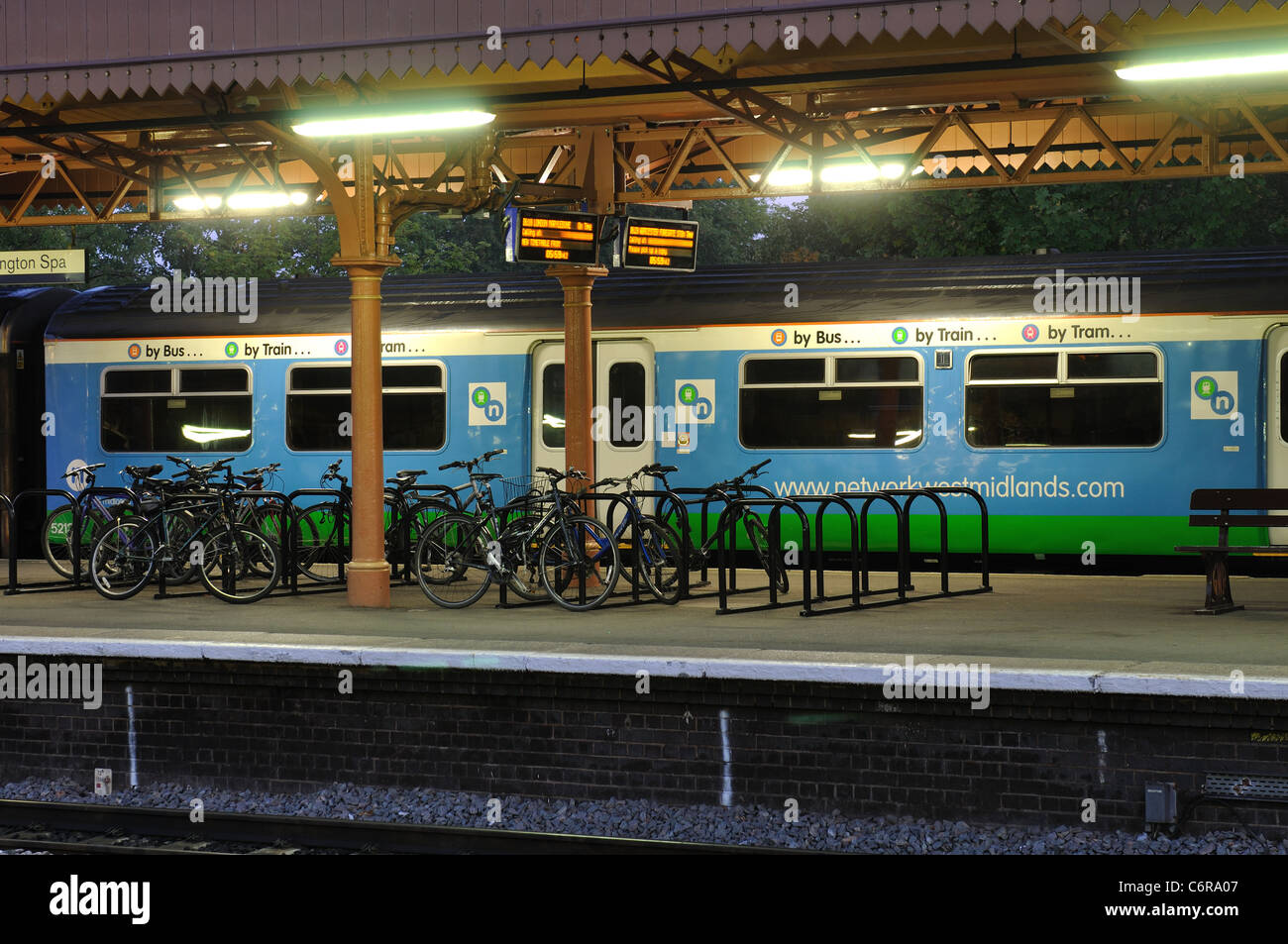 Network West Midlands train at Leamington Spa railway station, early morning, Warwickshire