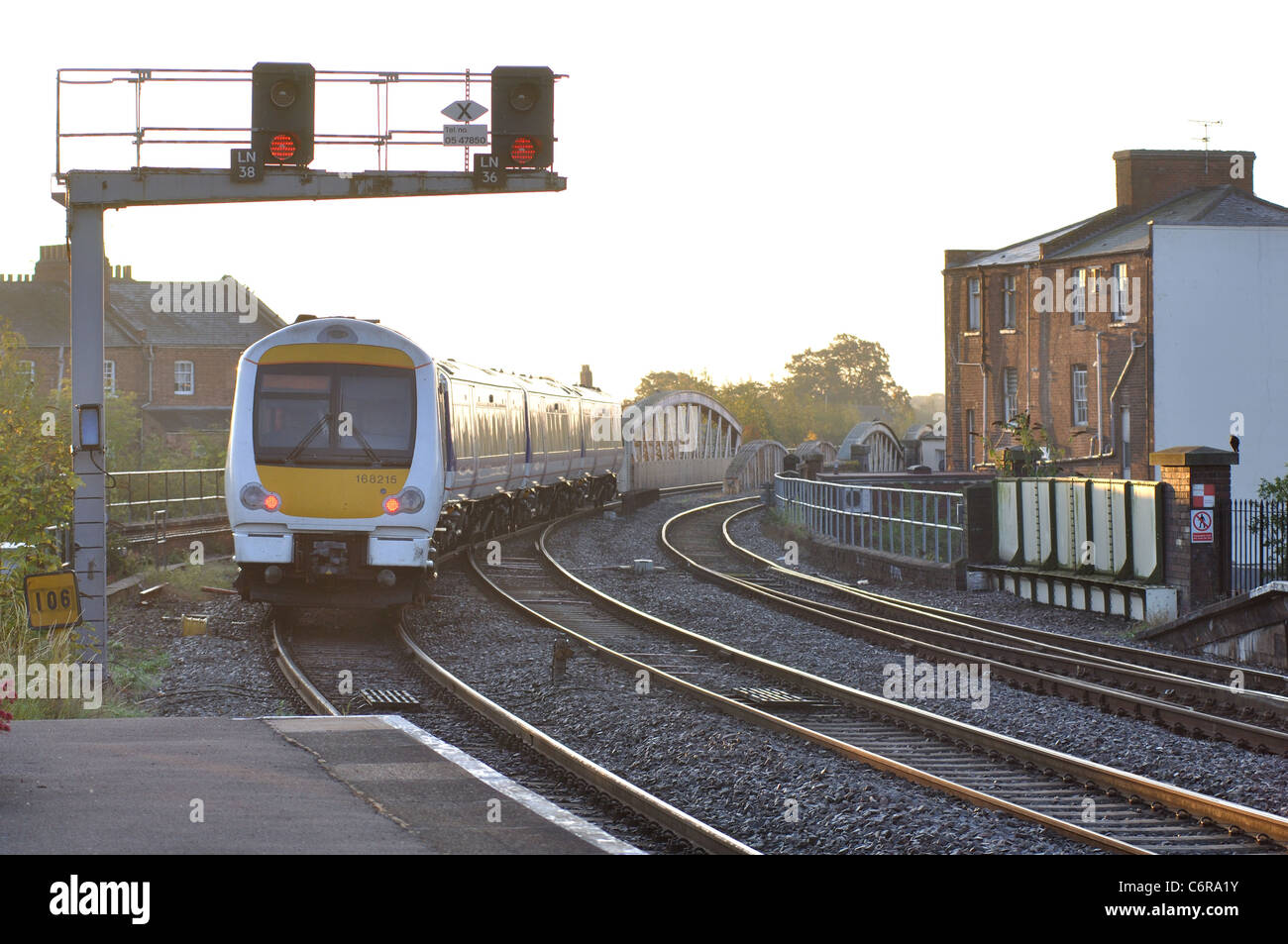 An early morning Chiltern Railways train leaving Leamington Spa station, Warwickshire, UK Stock Photo