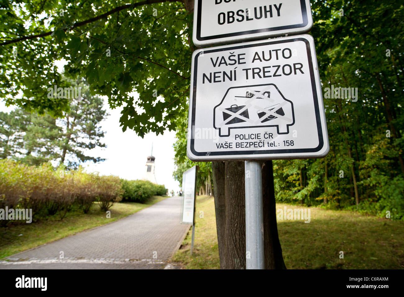 Signpost warning of burglary on the museum parking lot at the Austerlitz battlefield. Stock Photo