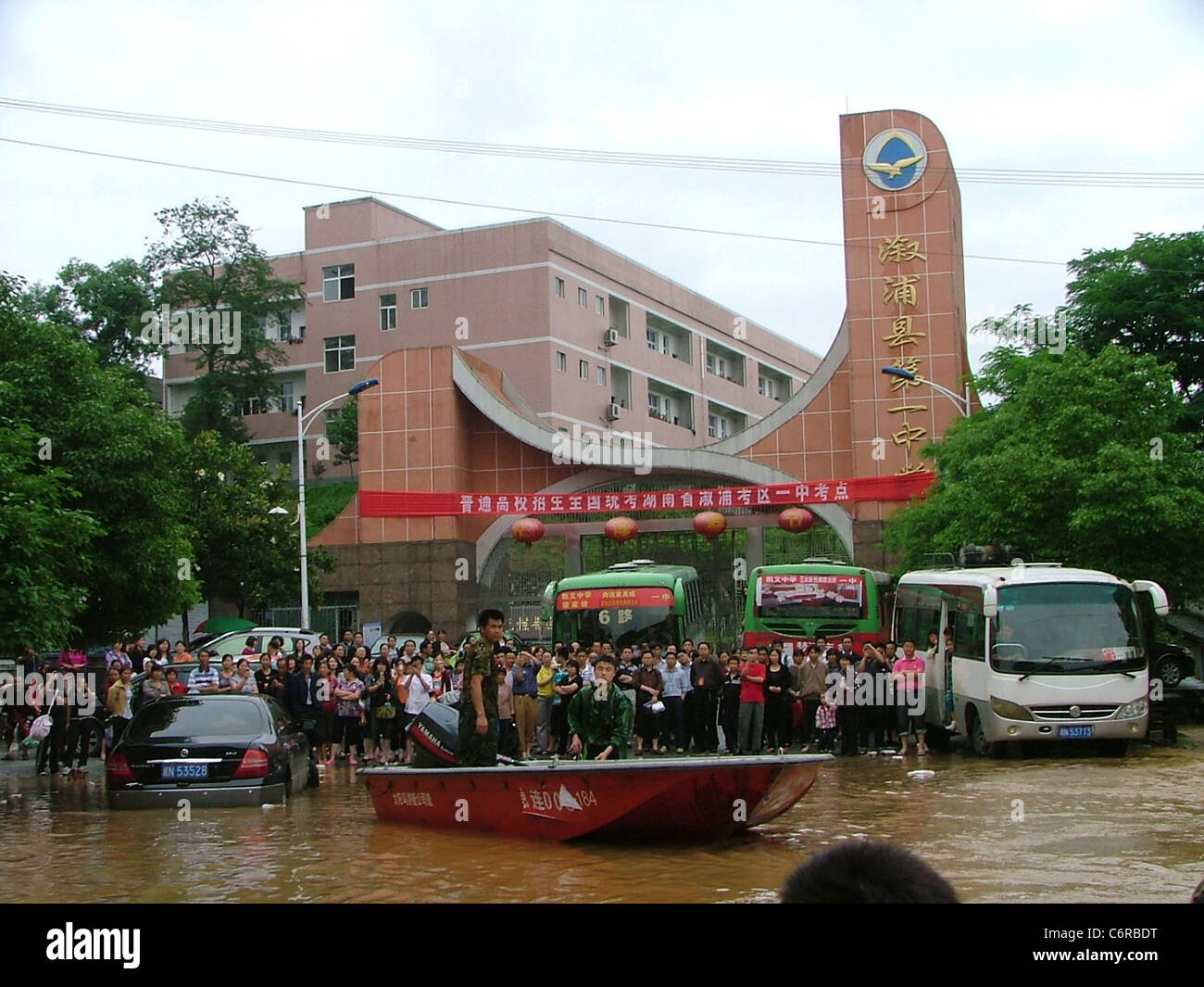 Entrants for the National College Entrance Exam are transferred to a ...