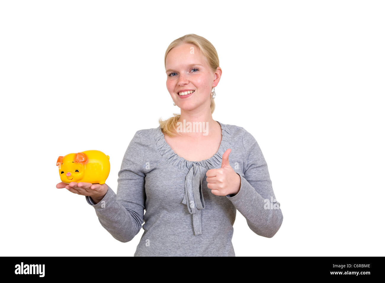 Young woman with piggy bank Stock Photo - Alamy