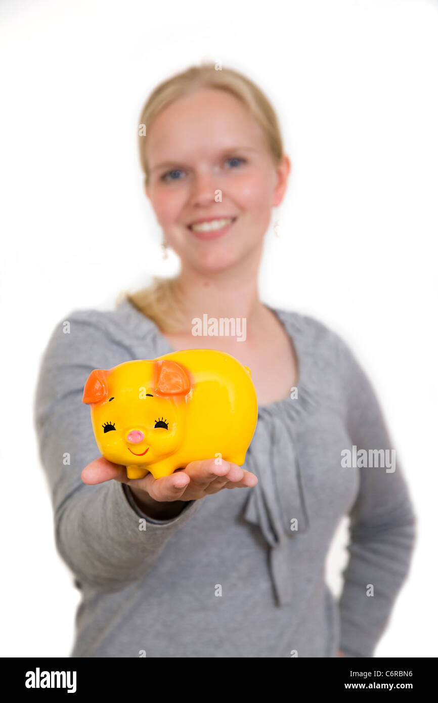 Young woman with piggy bank Stock Photo - Alamy