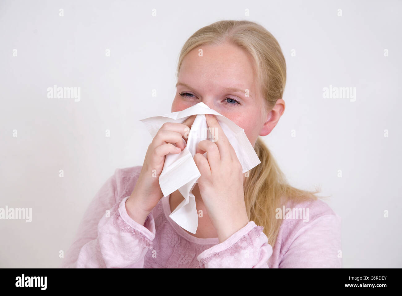 Young woman caught a cold Stock Photo Alamy