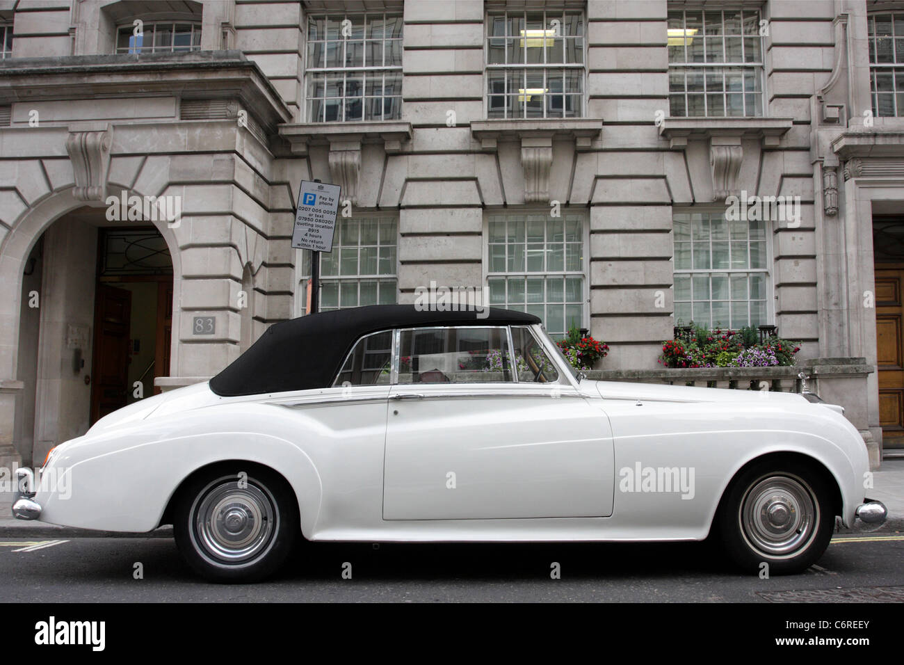 Delightful Rolls Royce Silver Cloud 11 convertible, viewed here in Pall Mall, London. Stock Photo
