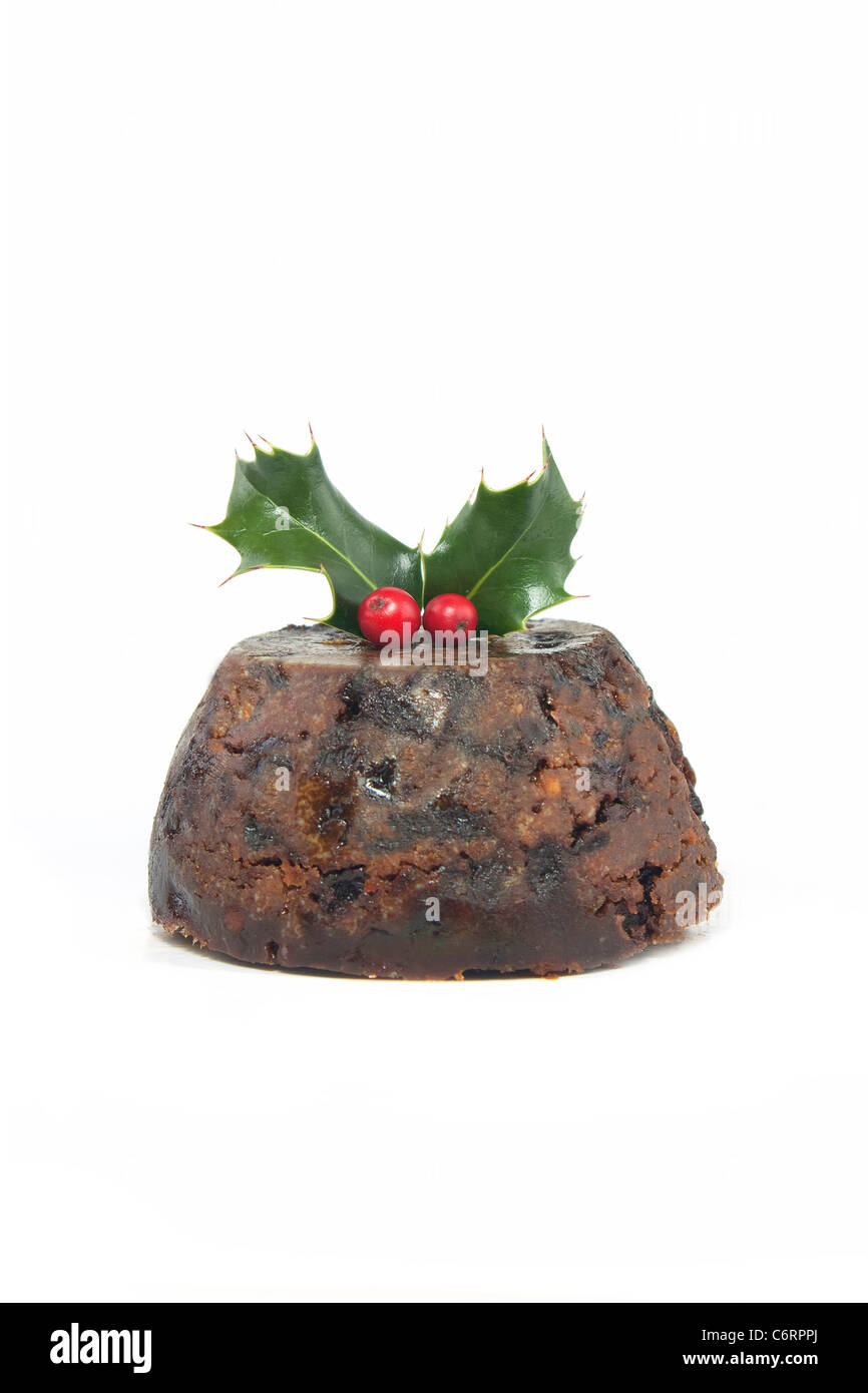 christmas pudding with holly and red berries on white background Stock Photo