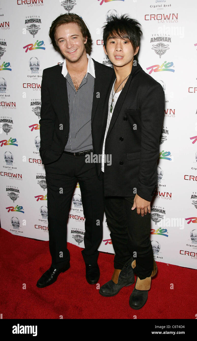 Michael Welch and Justin Chon Twilight Saga stars Michael Welch and Justin Chon walk the Red Carpet at Crown Nightclub at the Stock Photo