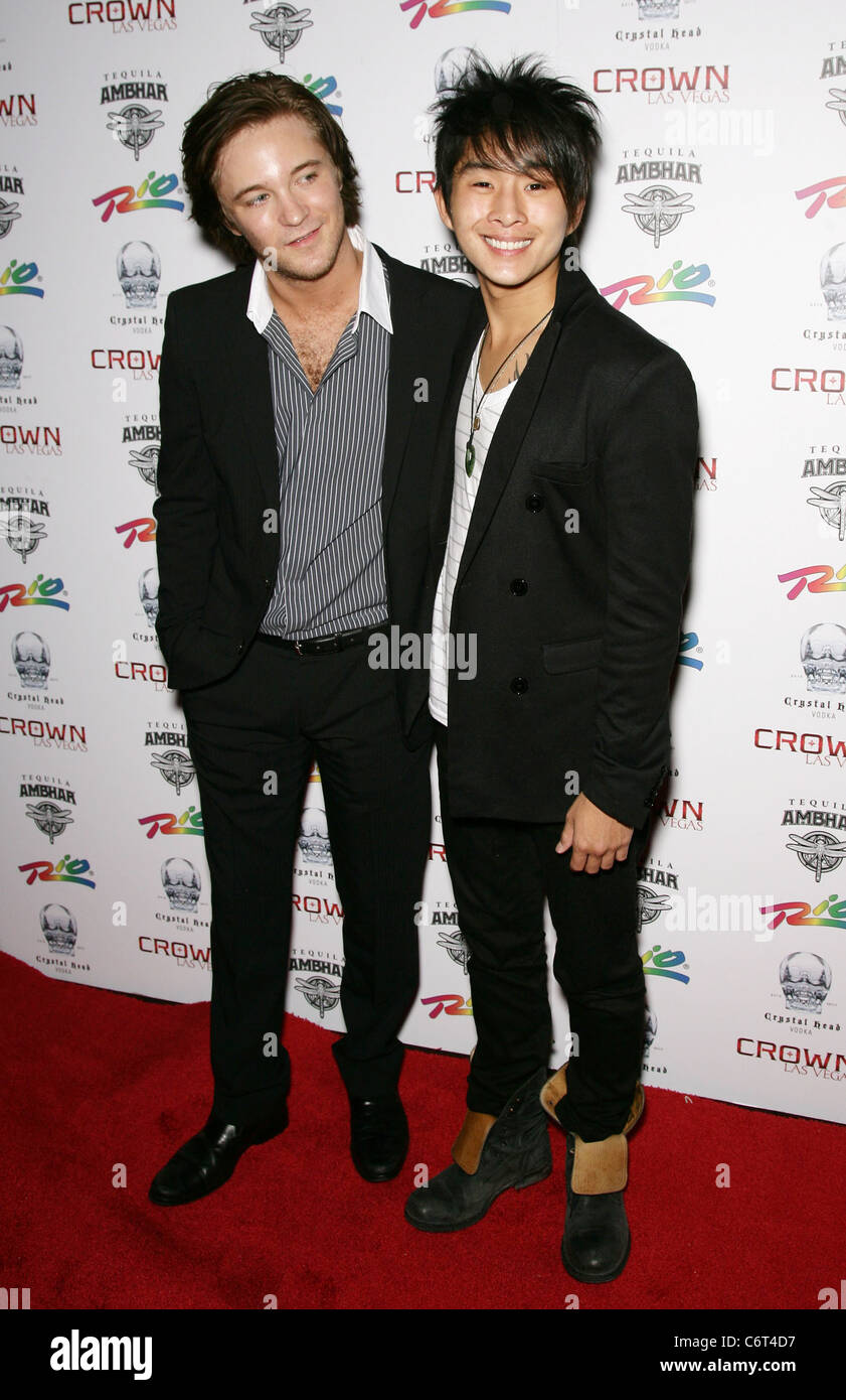 Michael Welch and Justin Chon Twilight Saga stars Michael Welch and Justin Chon walk the Red Carpet at Crown Nightclub at the Stock Photo