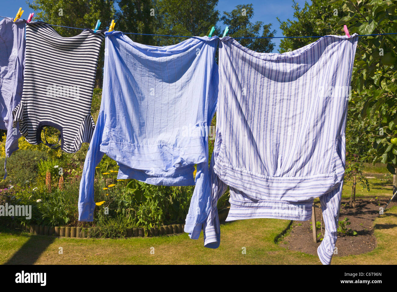Washing hanging on clothes line Stock Photo