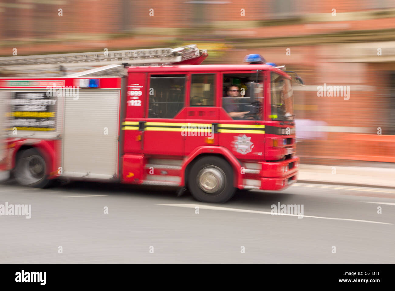 Ambulance driving quickly, Birmingham Stock Photo