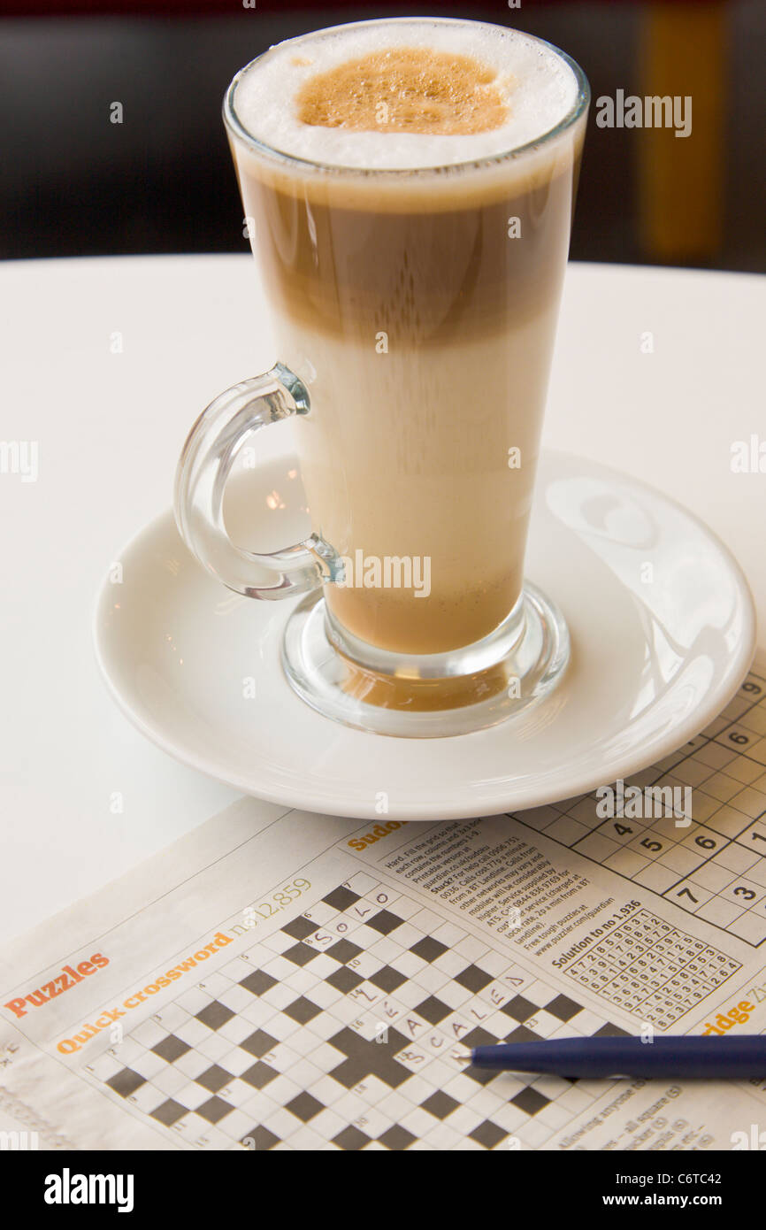 Latte coffee and crossword Stock Photo