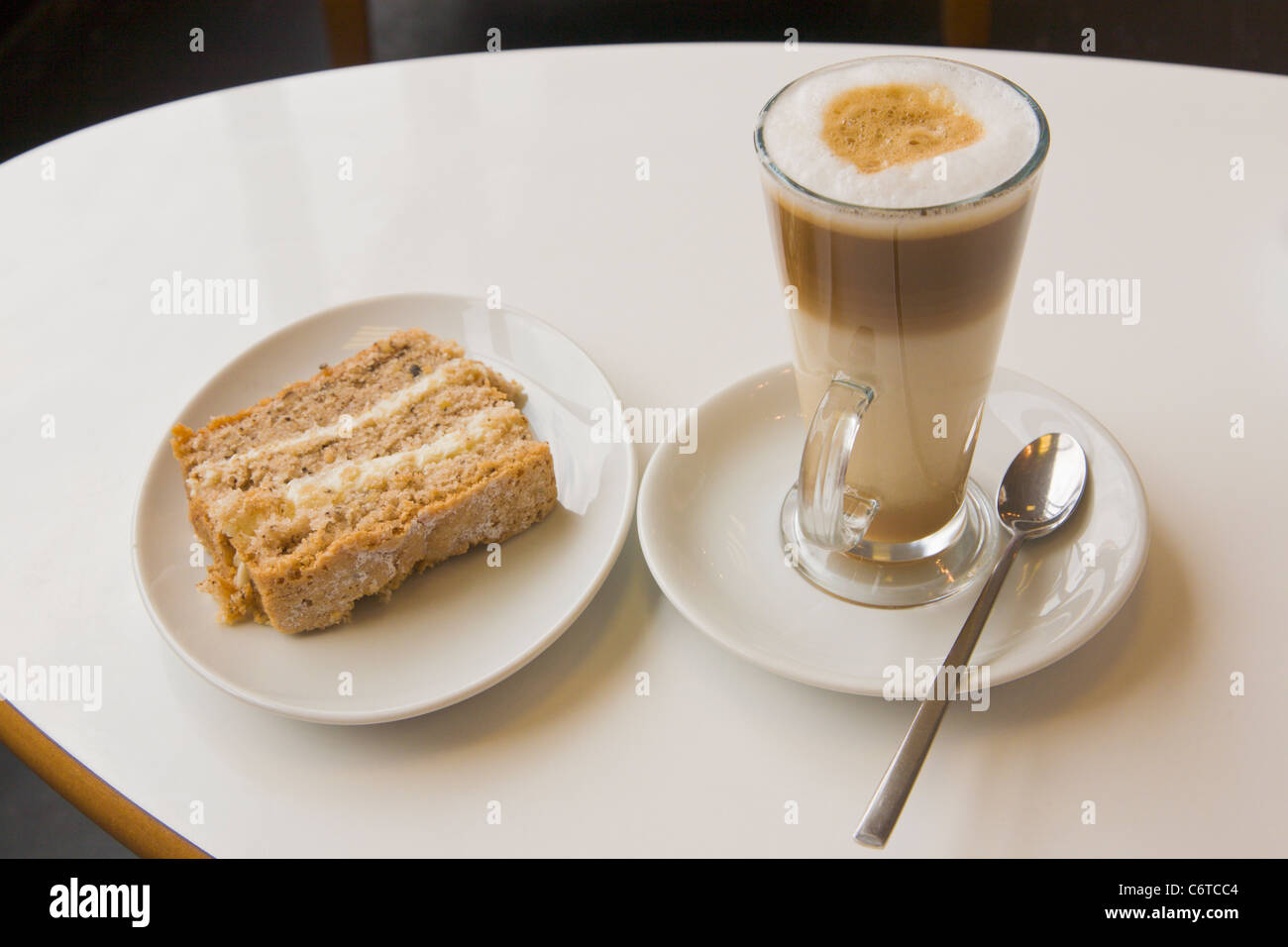 Latte coffee, walnut cake Stock Photo
