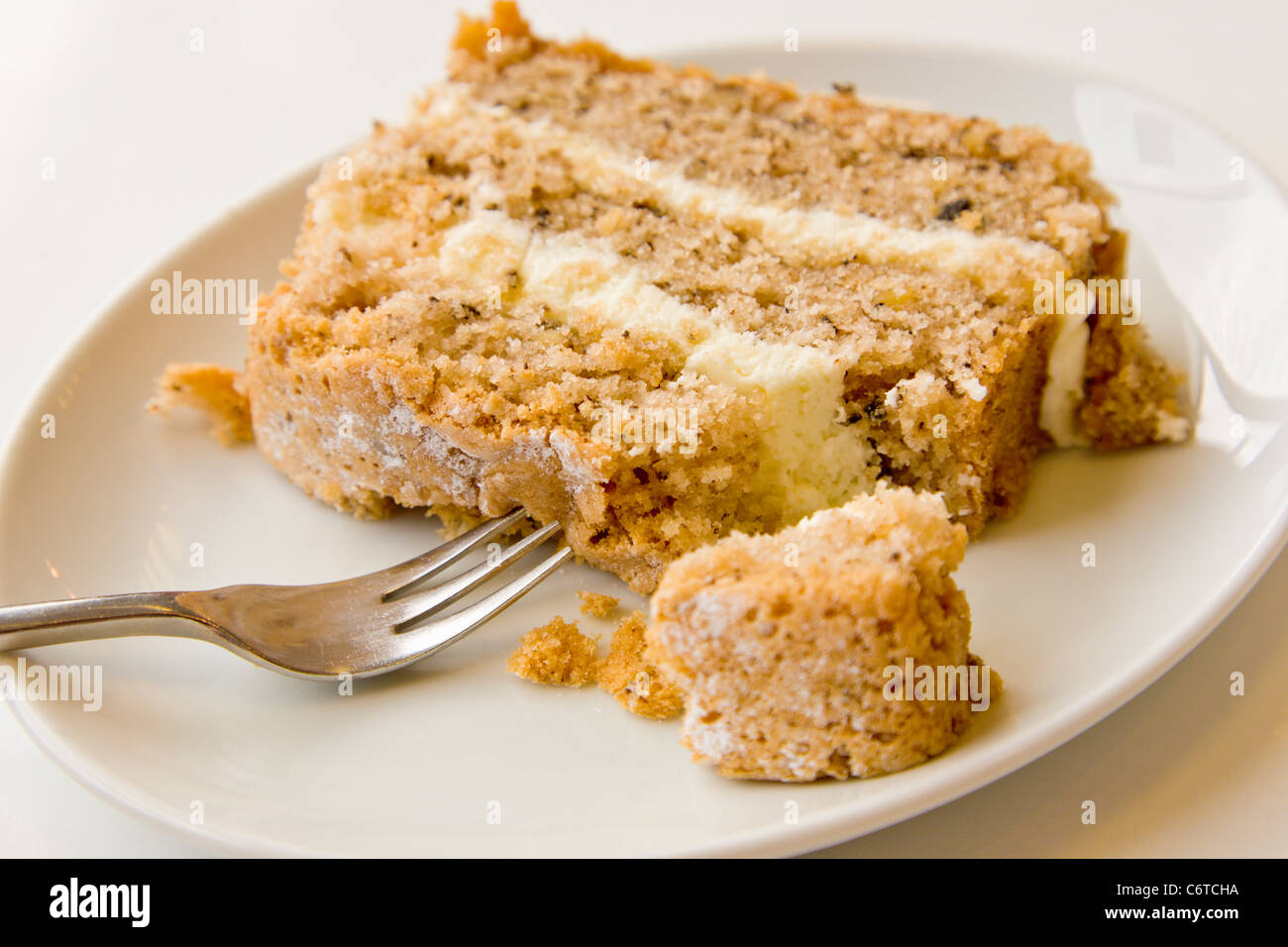 Walnut cake on plate Stock Photo