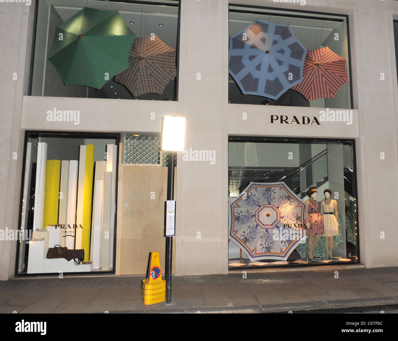 Smash and Grab thieves target the Prada store on Bond Street, around 1am, breaking through the front entrance of the shop. It Stock Photo