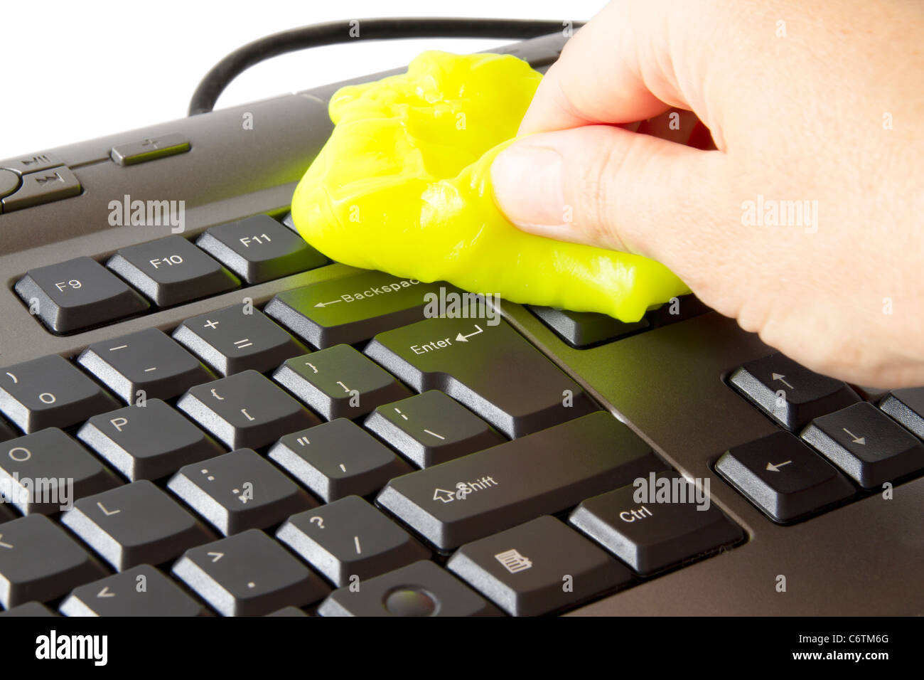 hand who clean the keyboard with a special sponge Stock Photo