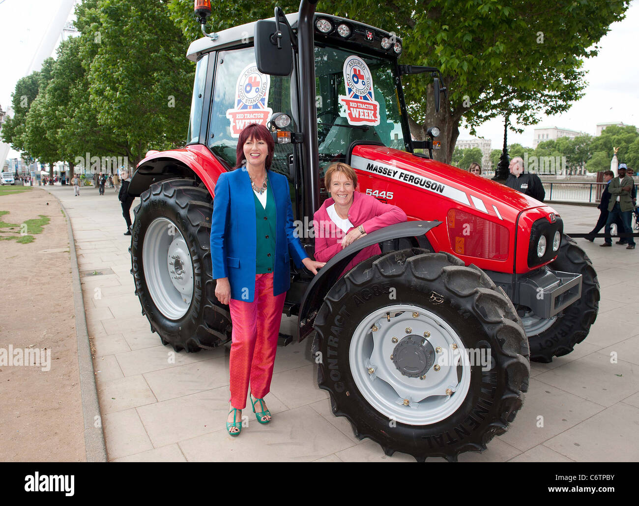 Janet Street Porter and environment secretary Caroline Spelman cut a giant Tractor cake to celebrate 10 years of Great Food and Stock Photo